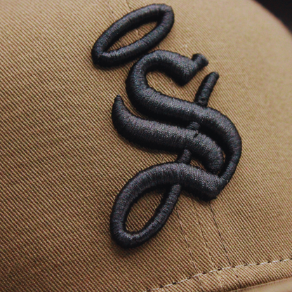 FLAT BROWN CAP WITH "S" SHIELD